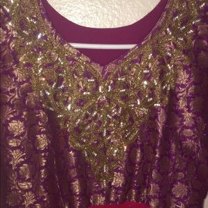 purple nd pink long dress it has purple tights